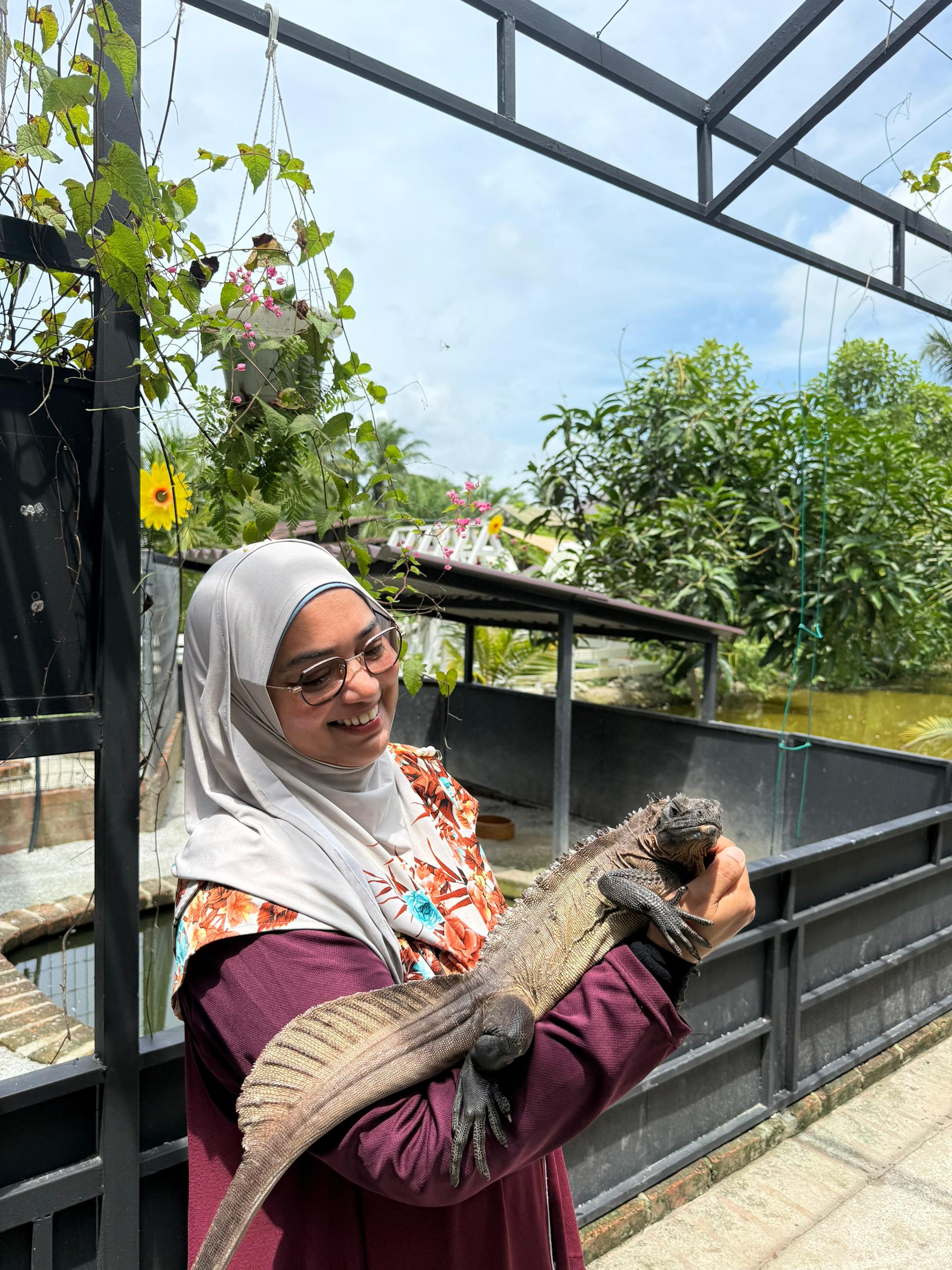Visitor interacting with farm animals